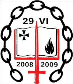 An illustration featuring a stylized emblem enclosed by a chain link border. The central emblem is divided into two halves; the left shows a black star atop the dates "2008" and "2009," and the right displays a red flame. A red cross divides these symbols vertically. The top of the emblem is marked with the numbers "29" and "VI."