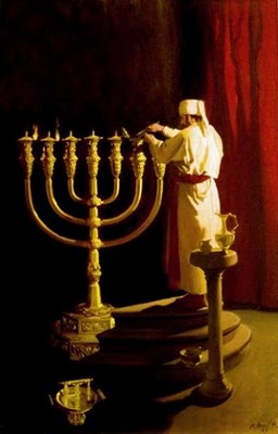 An oil painting depicting a person in traditional white garments lighting a menorah, a seven-branched candelabrum, typically used in historical Jewish rituals. The setting is indoors with a dark red curtain backdrop enhancing the solemnity of the scene.