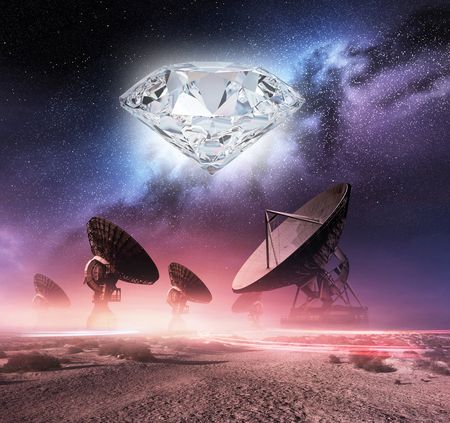 A large, radiant diamond hovers in the celestial expanse above an array of large satellite dishes on a desert landscape under a starlit sky.