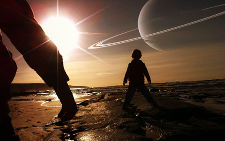 Silhouettes of two people, one adult and one child, walking on a beach at sunset with a large, artistic depiction of a planet and its rings in the sky, creating a dramatic celestial scene in a similar style to what might be described in the Mazzaroth.
