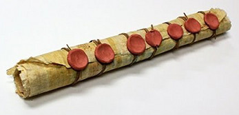 An ancient, rolled parchment sealed with multiple red wax seals, reminiscent of historical documents or biblical scrolls that might contain celestial or Mazzaroth charts.