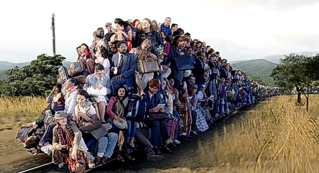 A surreal image depicting a seemingly endless line of diverse people, of various ages and styles of dress, seated atop and along a narrow path through grassy terrain, suggesting a metaphorical journey through terrestrial landscapes.