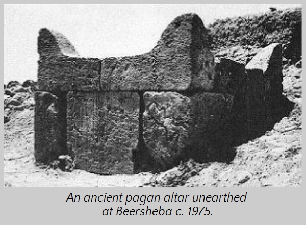 Black and white photo of an ancient stone structure uncovered in Beersheba, resembling a historical construction. Dated approximately 1975, this site is linked to traditional cultures.