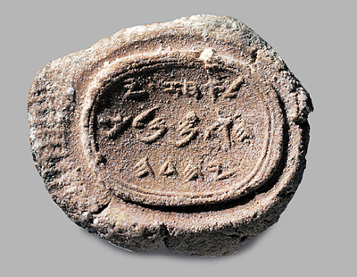 An ancient clay seal featuring inscribed symbols that represent different constellations of the Mazzaroth.