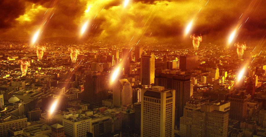A digitally enhanced image depicting a cityscape with skyscrapers under a dramatic fiery sky. Multiple fiery meteor-like objects descend upon the city from the heavens, creating an apocalyptic scene.