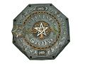 An aged octagonal chart depicting cycles of the Mazzaroth, eroded metallic and stone textures, with central nautical star surrounded by concentric circles bearing ancient script and symbols.
