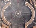 Aerial view of a large circular structure with segmented designs resembling sections of the celestial sphere, celebrating themes connected with the Mazzaroth.